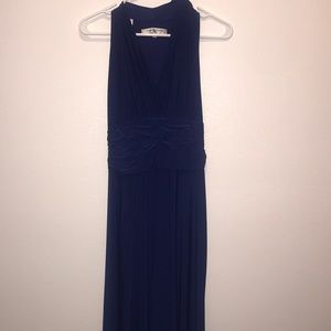 Blue sleeveless dress.